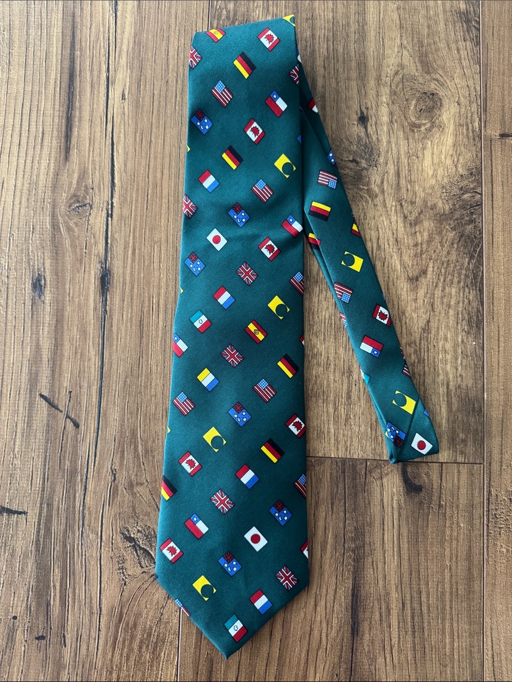 Men’s green tie with flags